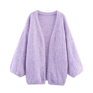 Detail of lavender oversized knit cardigan featuring soft feather yarn texture and ribbed cuffs