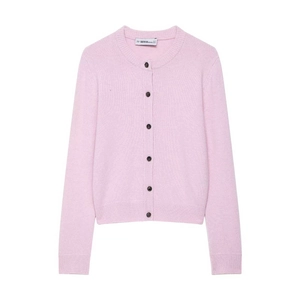Close-up of pink knit cardigan neckline with dark buttons and brand size tag