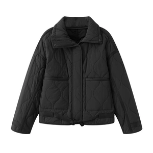Women's black quilted jacket with wave pattern stitching and large cargo pockets