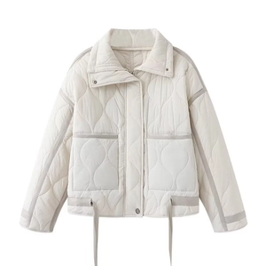 Women's cream quilted jacket with stylish wavy stitching and large cargo pockets