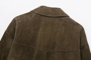 Detailed view of dark brown suede jacket back with neat stitching and refined texture