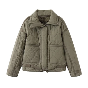 Olive green wave-quilted jacket featuring a high collar, large pockets, and drawstring hem