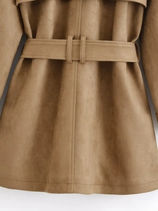 Detail of deep camel suede coat back with matching belt and stitching textures