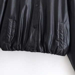 Women's black PU leather jacket with elastic hem and button closure detail