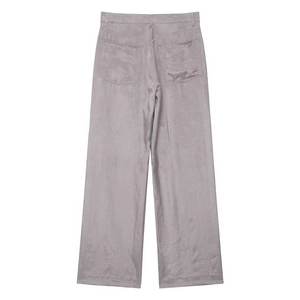 Detail view of grey high-waisted wide-leg pants back side with large pockets and texture