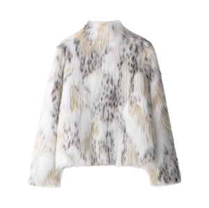 Detailed macro view of the soft faux fur texture and leopard pattern on the coat