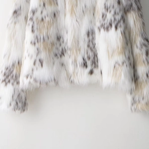 Chic leopard print faux fur coat for women with loose fit and soft spotted texture