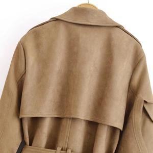 Back view of brown faux suede trench coat with storm flap and waist tie detail