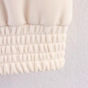 Fashionable cream textured button jacket featuring high-quality elastic cuffs and soft fabric