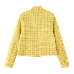 Back view of yellow tweed jacket featuring woven texture and delicate fringe trim