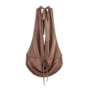 Detail of brown halter top with adjustable neck ties and draped cowl neckline