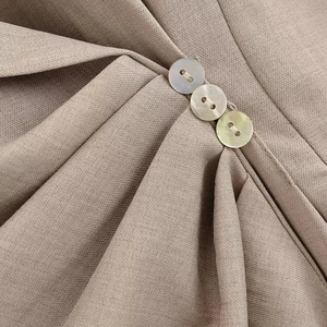 Chic ruched waist blazer in terracotta with pearl buttons and diagonal twill texture