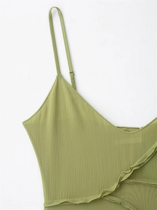 Detail of avocado green camisole with adjustable straps and textured ruffle fabric