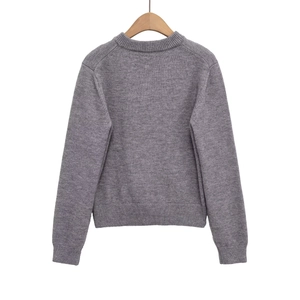 Back view of a grey long sleeve knitted sweater with ribbed hem and crew neck detail