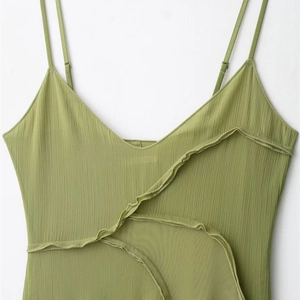 Grass green slim fit dress with thin straps V-neckline and ruffled pleated texture detail