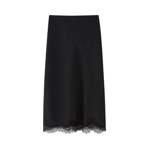 Close-up of elegant black satin midi skirt featuring delicate lace trim and smooth texture