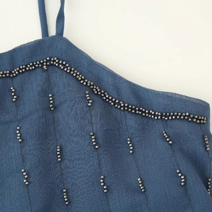 Navy blue backless camisole top with beaded details and minimalist thin straps for women