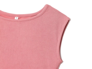 Close-up of pink ribbed texture on a sleeveless top showing the round neckline and size S tag