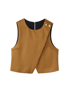 Detail of caramel asymmetric vest showing cross-over front and golden buttons