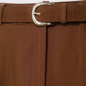 Deep brown trousers with belt featuring gold oval buckle and textured twill fabric detail