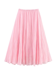 Close-up of pink pleated maxi skirt showing fine mesh texture and vertical folds