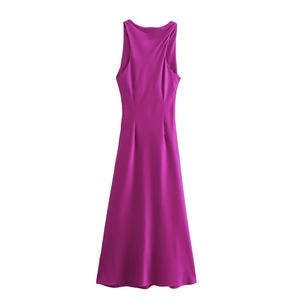 Detail showing the deep purple satin fabric texture and backless design of the midi dress