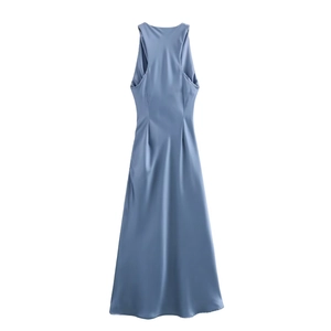 Detail view of the elegant open back and glossy satin fabric of the blue midi dress