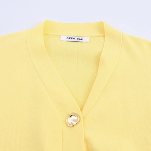 French style light yellow knit cardigan with deep V-neck and artistic gold button