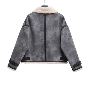 Back view of a faux suede moto jacket featuring sheepskin trim and adjustable leather straps