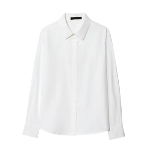 Close-up of elegant white long sleeve shirt with classic turn-down collar and smooth fabric