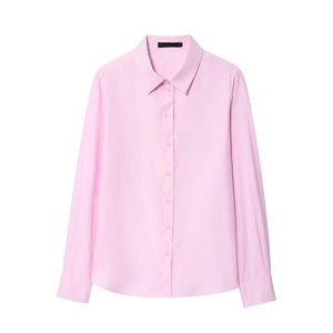 Close-up of light pink long sleeve button-up shirt with classic pointed collar and curved hem