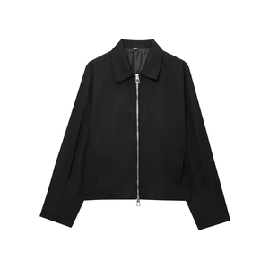 Detail of black cropped baseball jacket showing silver zipper and lapel collar