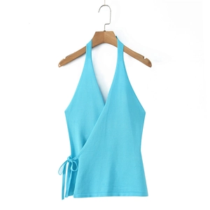 Sky blue knitted halter wrap top with side tie design on a wooden hanger