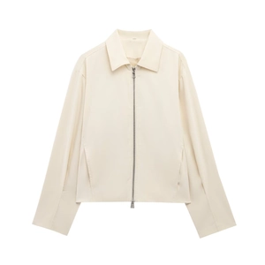 Detail view of cream zipper jacket featuring a classic lapel and metallic dual zippers