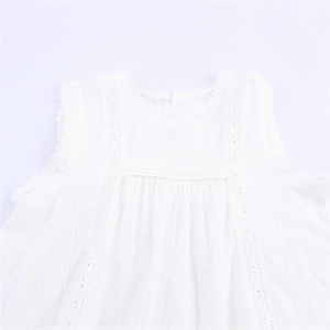 White sleeveless cotton top with lace trimming and pleated details in pastoral style