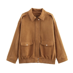 Detail of camel faux suede jacket with silver buttons and elastic hemline