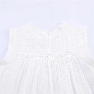 Women's white sleeveless cotton top with delicate hollow lace trim and pleated texture