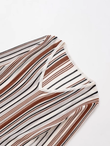 Detailed view of V-neckline and horizontal stripe texture on linen blend knit sweater