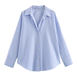 Detail of blue striped shirt showing vertical stripes and contrast horizontal cuffs