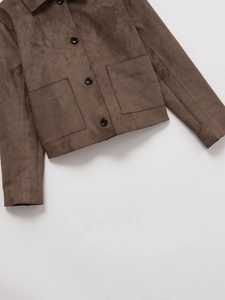 Cropped view of dark brown faux suede jacket with classic shirt collar and large pockets