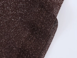 Detail of dark brown mesh fabric with metallic silver threads and wavy texture