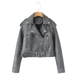 Detail of grey biker jacket featuring a notched lapel, zippers and metal-buckled belt