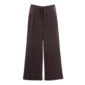 Close-up of charcoal wide-leg trousers featuring a metallic glitter texture and drawstring