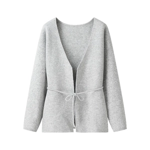 Light gray long sleeve knit cardigan with a waist tie belt and deep V-neckline