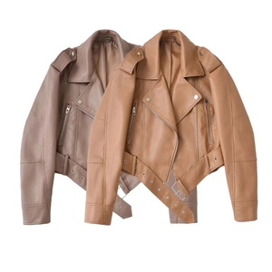 Detail view of washed PU leather biker jackets with asymmetric zippers and waist belts