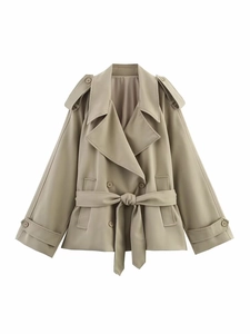 Detailed view of khaki trench coat with double-breasted buttons and waist belt
