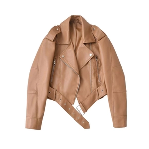 Detail of camel PU biker jacket featuring asymmetric silver zippers and adjustable belted waist