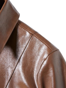 Women's brown PU leather jacket featuring detailed lapel collar and shoulder stitching
