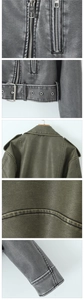 Close-up of vintage PU leather jacket featuring metallic zippers and buckle belt detail