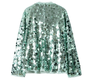 Detail of mint green sequin kimono jacket with silver reflective round sequins for parties